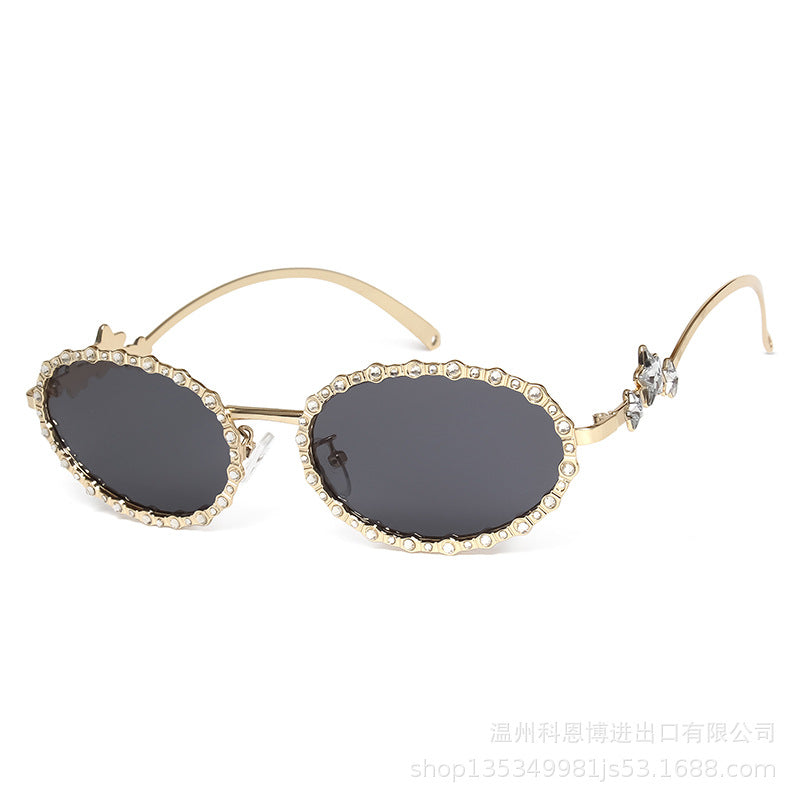 Wholesale Small frame diamond encrusted oval metal pentagram sunglasses