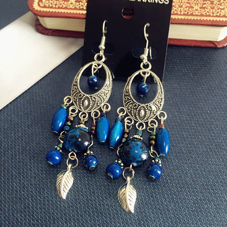 Wholesale Bohemian Retro Ethnic Style Ancient Silver Goddess Jewelry Face Skinny Tassel Long Earrings