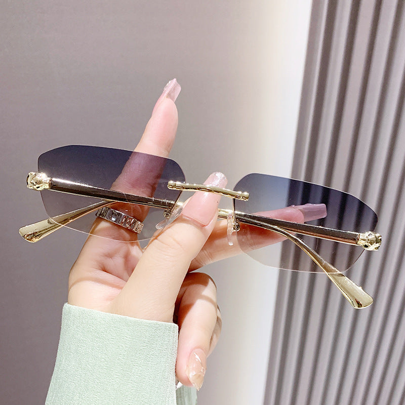 Wholesale Metal trimmed frameless polygonal cheetah decorative sunglasses