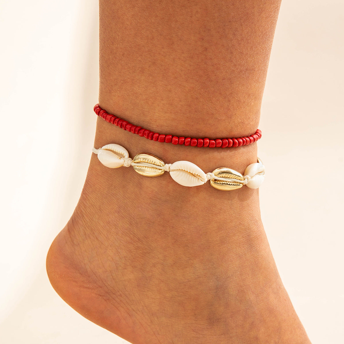 Two pieces of hand-woven anklets from shells