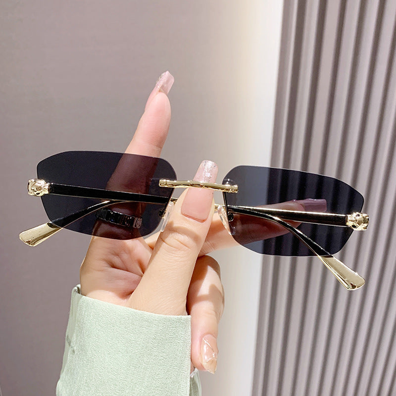Wholesale Metal trimmed frameless polygonal cheetah decorative sunglasses