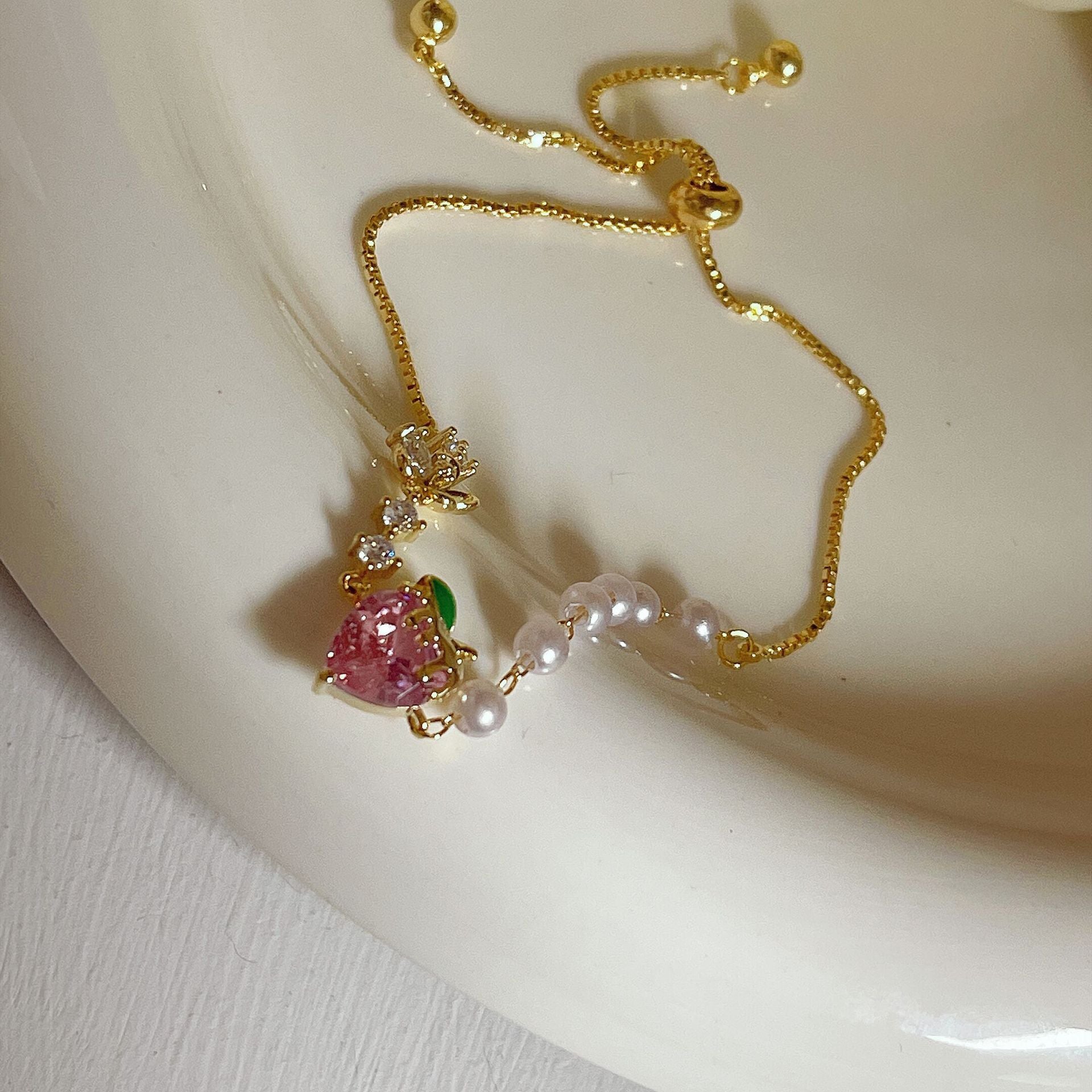 Wholesale Sweet Pink Strawberry Zircon Flower Pearl Metal Bracelet