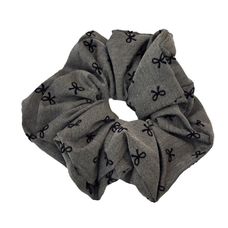 Wholesale Black polka dot bow with heart-shaped elastic headband