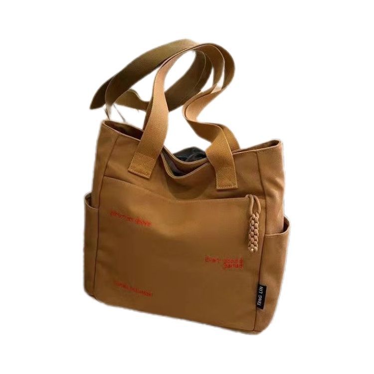 Wholesale Canvas bag shoulder bag large capacity commuter bag handbag bag