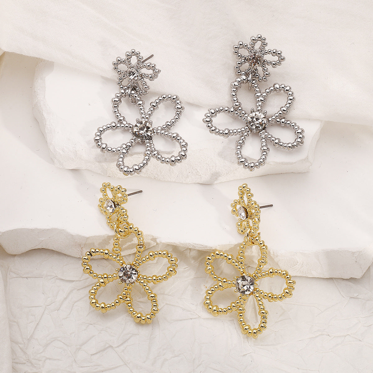 Wholesale metal-style geometric diamond earrings fresh and sweet hollow flowers earrings