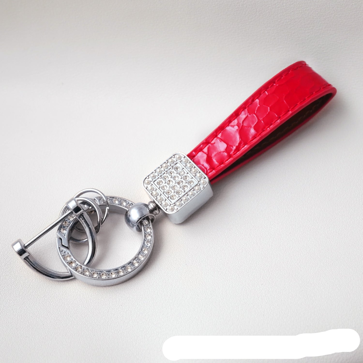 Wholesale Fashionable textured diamond spring ring keychain