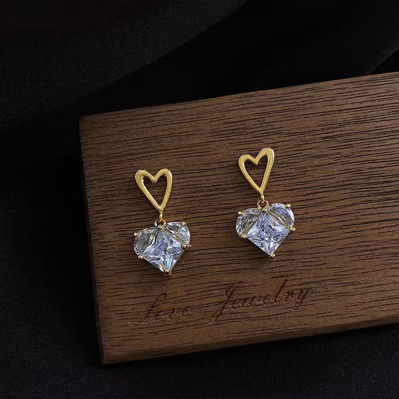 Wholesale Romantic heart-shaped peach pink earrings, fresh and sweet, simple and cool, super shiny earrings