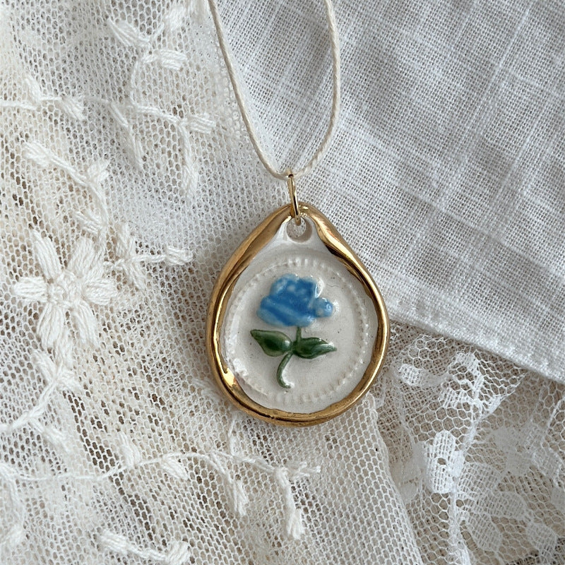 Wholesale rabbit flower print pendant stainless steel necklace