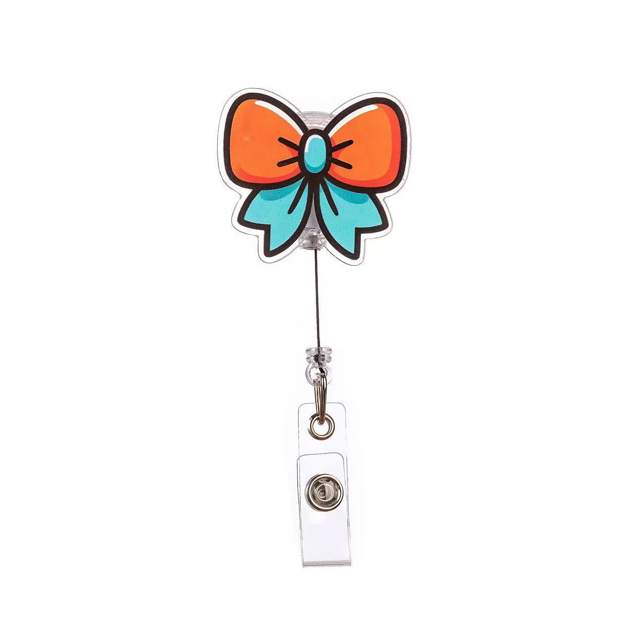 Wholesale Pink cherry medical staff with diverse bows Badge Reels