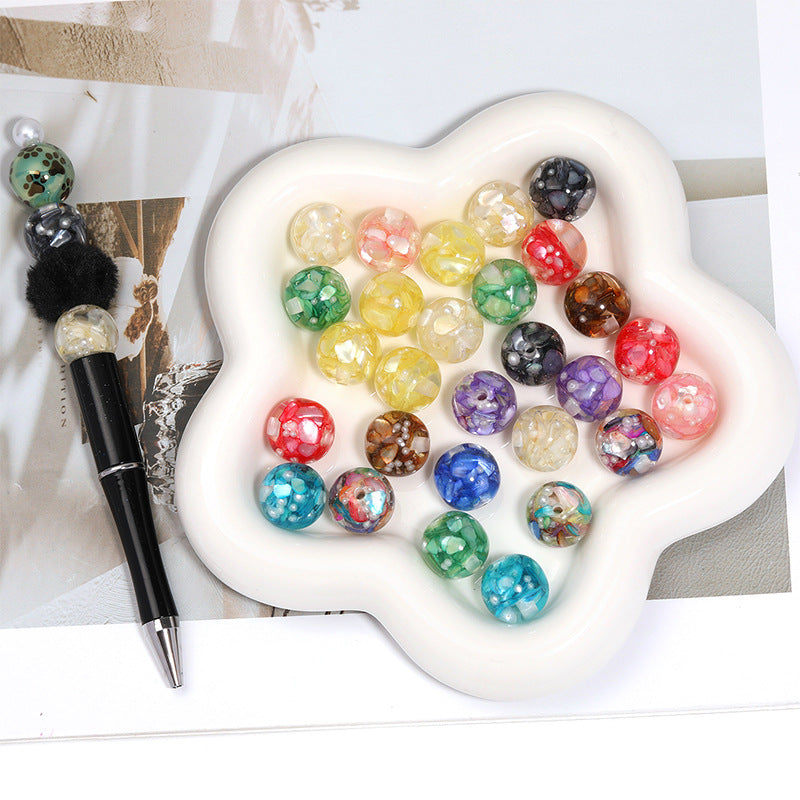 Wholesale  Random 100pcs/pack  Irregularly shaped     vibrant mother-of-pearl inlaid with translucent,  perforated beads.