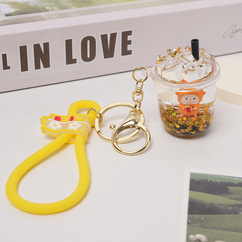 Wholesale Acrylic Cartoon Floating Bottle Into Oil Liquid Little Tiger Keychain