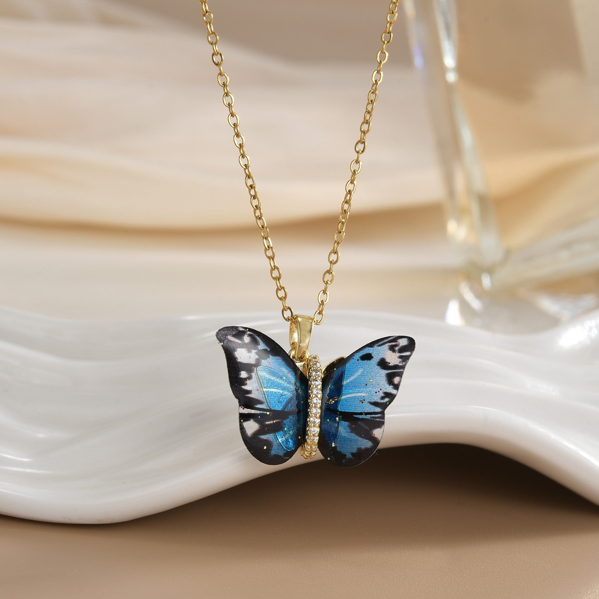 Wholesale Colored resin butterfly titanium steel locking chain