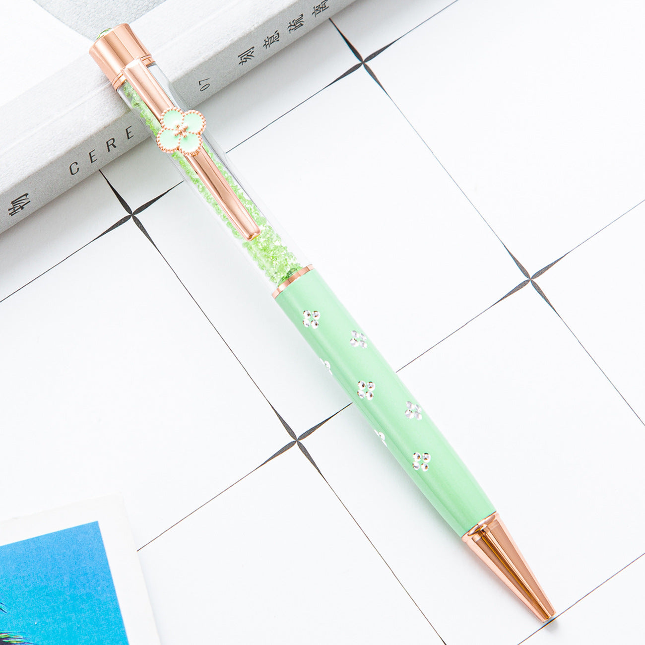 Bolígrafo de cristal de trébol de metal al por mayor