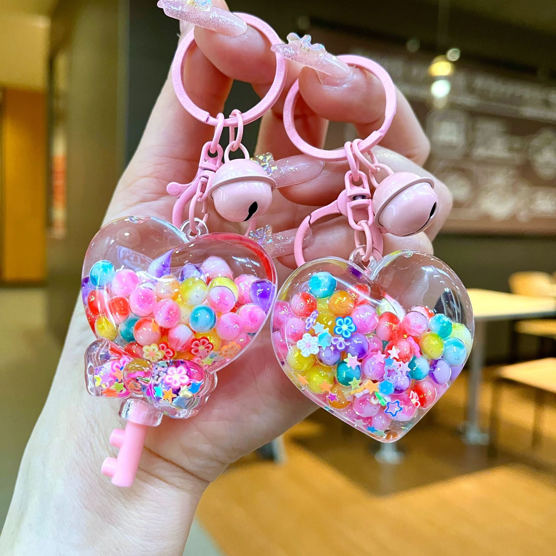 Wholesale Rainbow Candy Jelly Color Bead Sand Flow Bottle Liquid Keychain