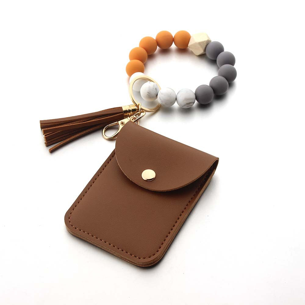 Wholesale Silicone Leather Tassel Bracelet Wooden Bead Keychain