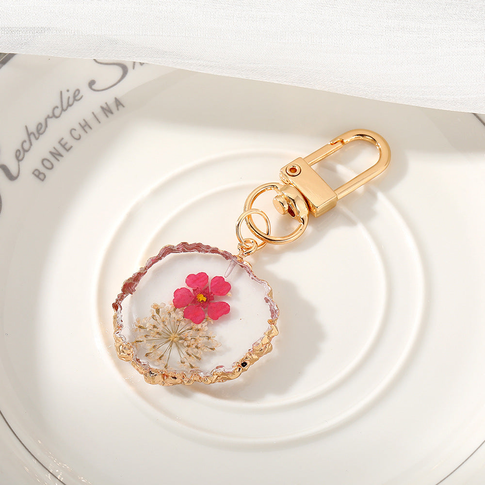 Wholesale Creative Frosted Epoxy Dried Flower December Flower Keychain