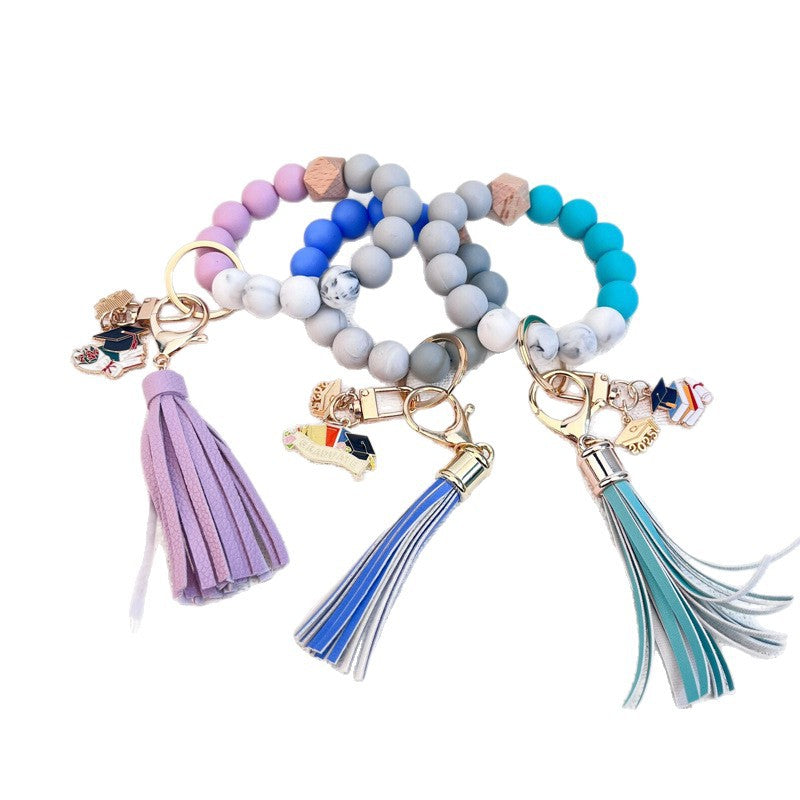 Wholesale Custom Silicone Bead Bracelet Keychain Tassel Graduation Class Gift For Classmates
