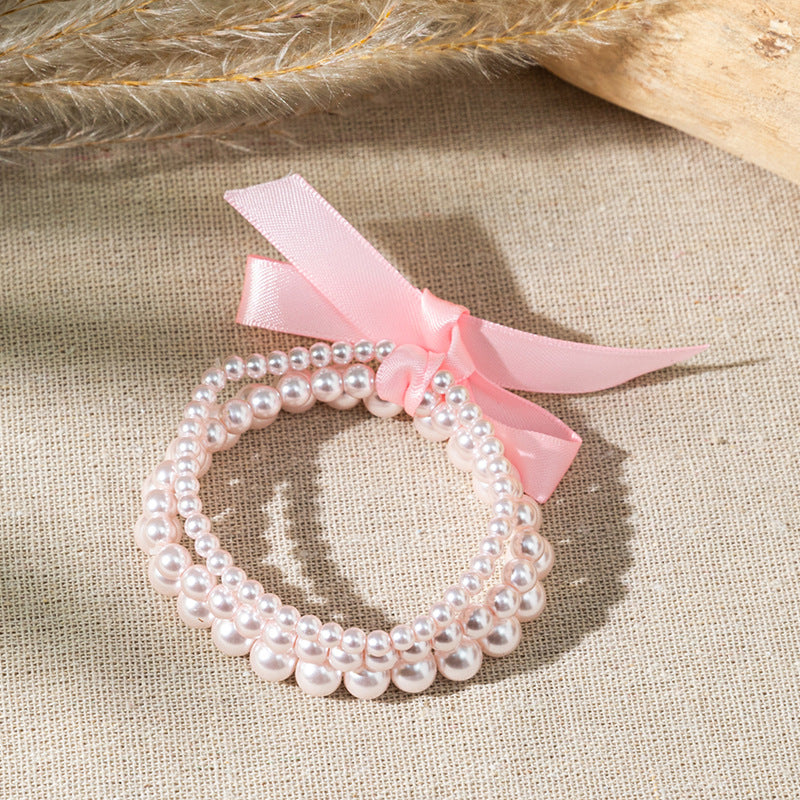 Wholesale Bow colored pearl Layered Bracelet Set