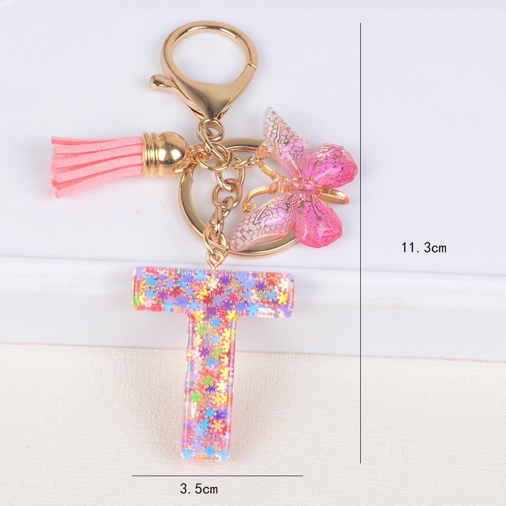 卸売スパンコールスノーフレークレター樹脂キーホルダー