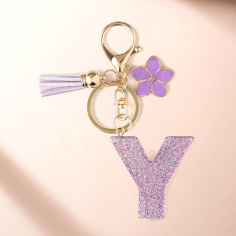 Wholesale Sparkling Pink 26 English Letter Purple Flower Keychain
