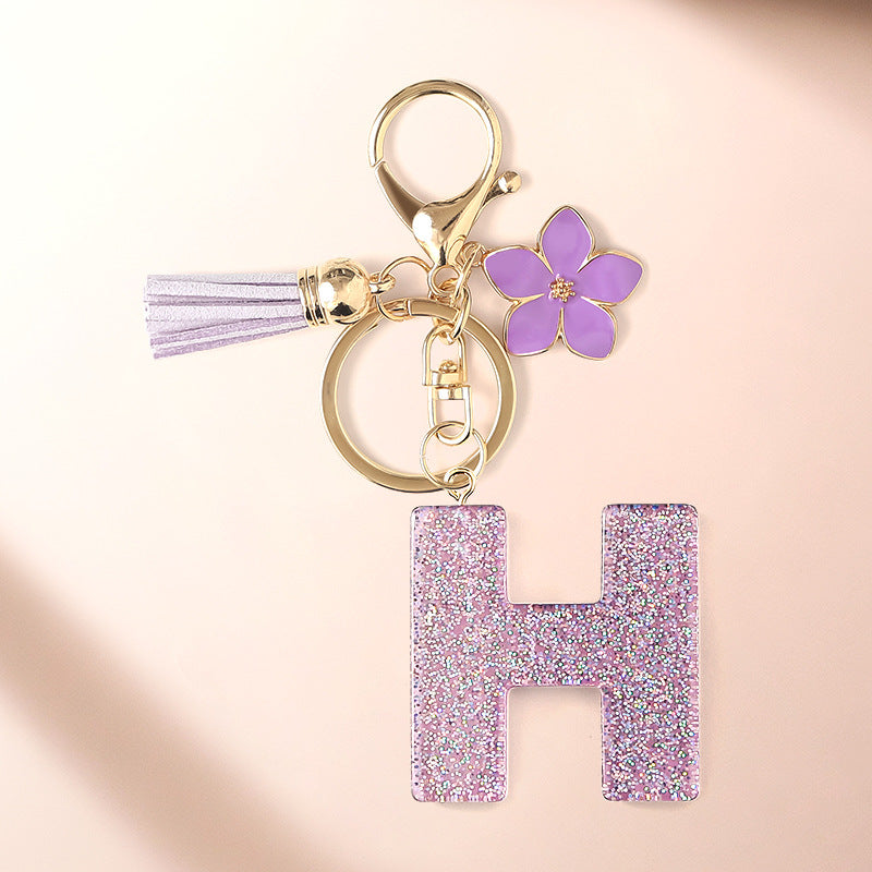 Wholesale Sparkling Pink 26 English Letter Purple Flower Keychain