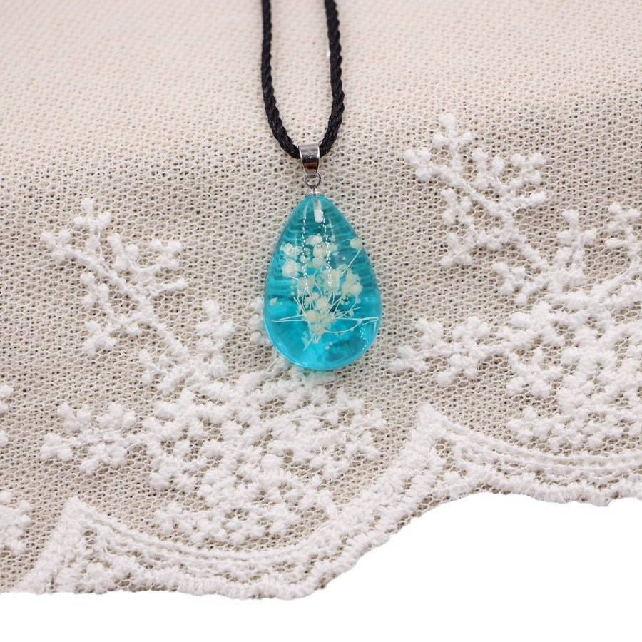 Wholesale Handmade Resin Pendant Necklace With Dried Flowers Blue Glow In The Dark Nature Design Boutique Jewelry Accessory