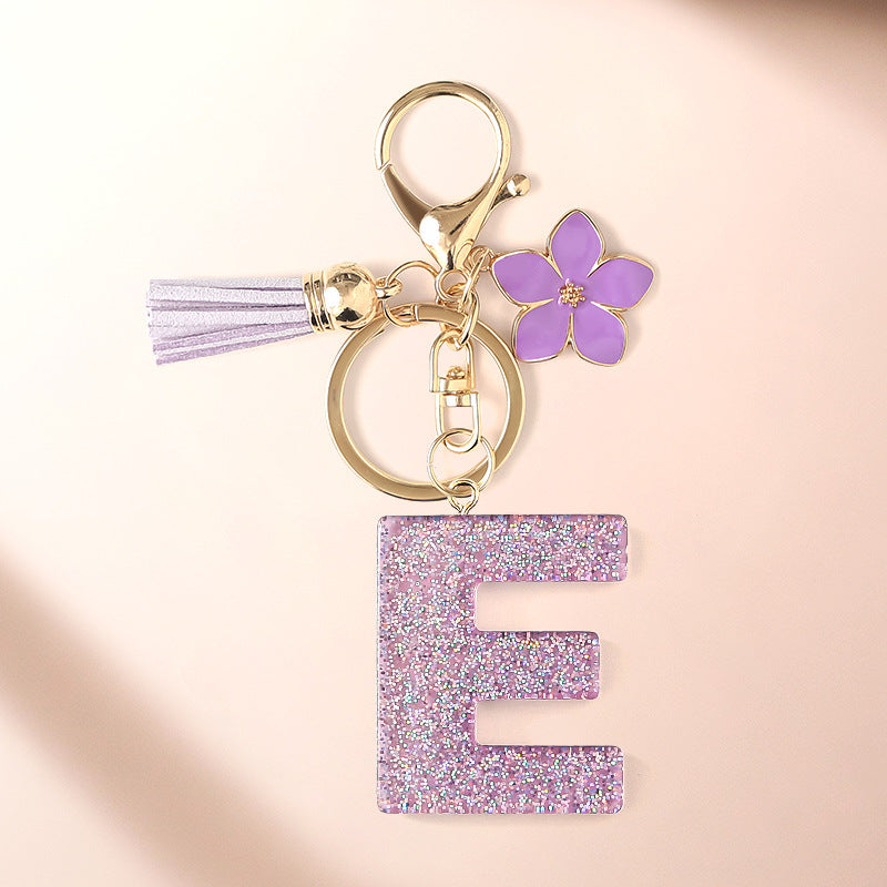 Wholesale Sparkling Pink 26 English Letter Purple Flower Keychain