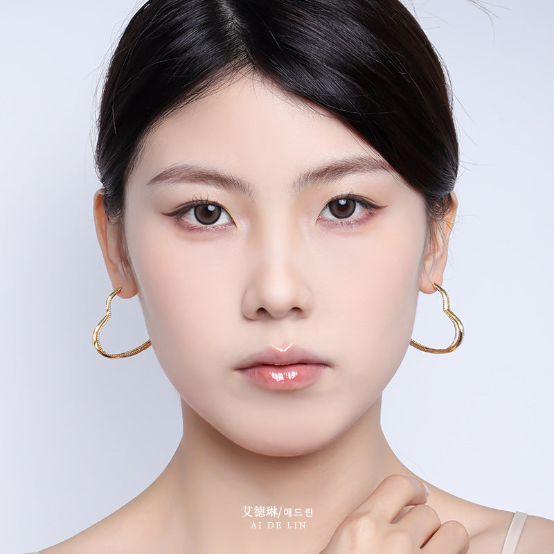 Wholesale Love Hollow Copper Earrings