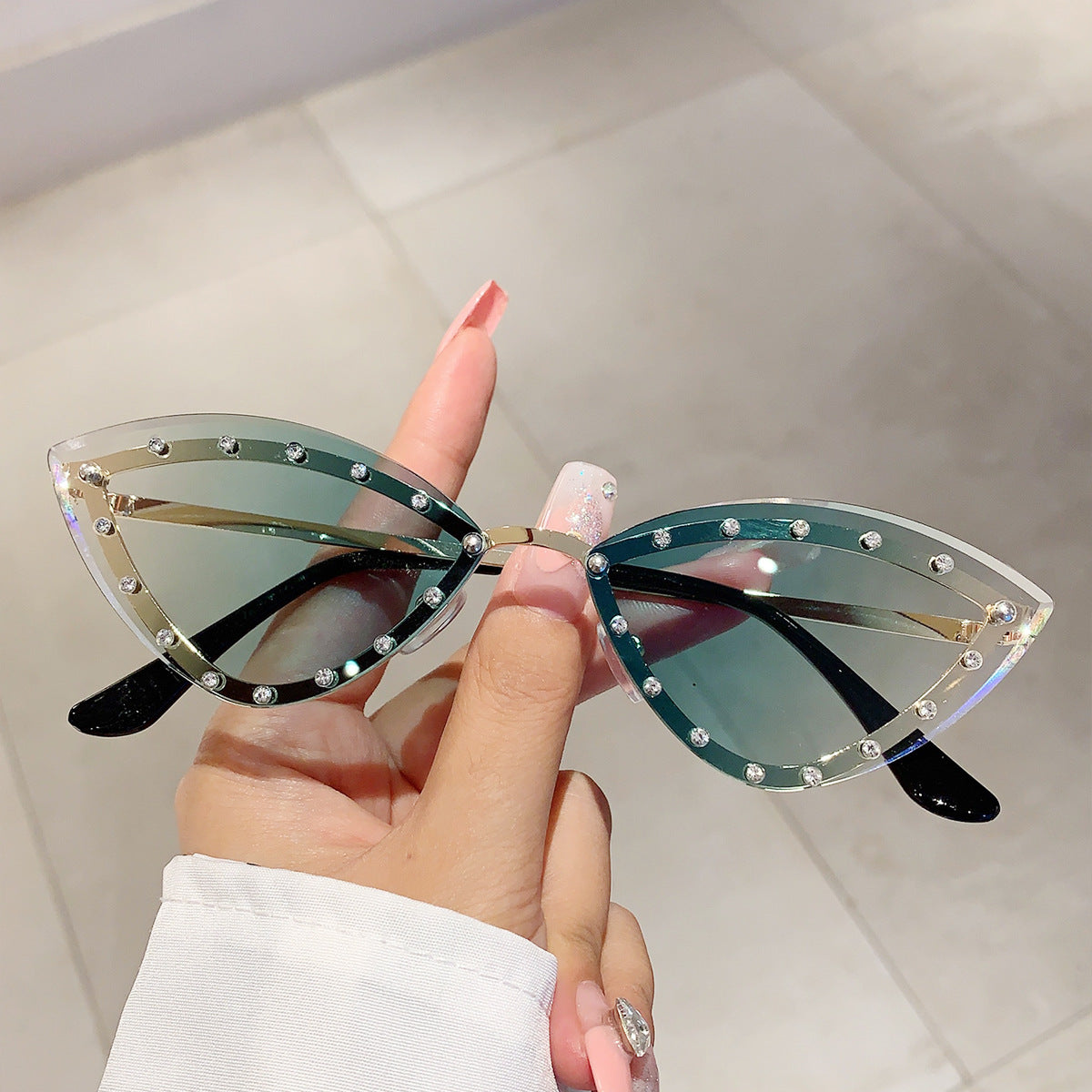 Wholesale Colorful rimless diamond cat-eye sunglasses