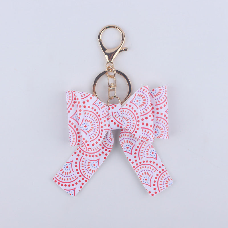 Wholesale Cartoon Aztec Color Bow Leather Keychain