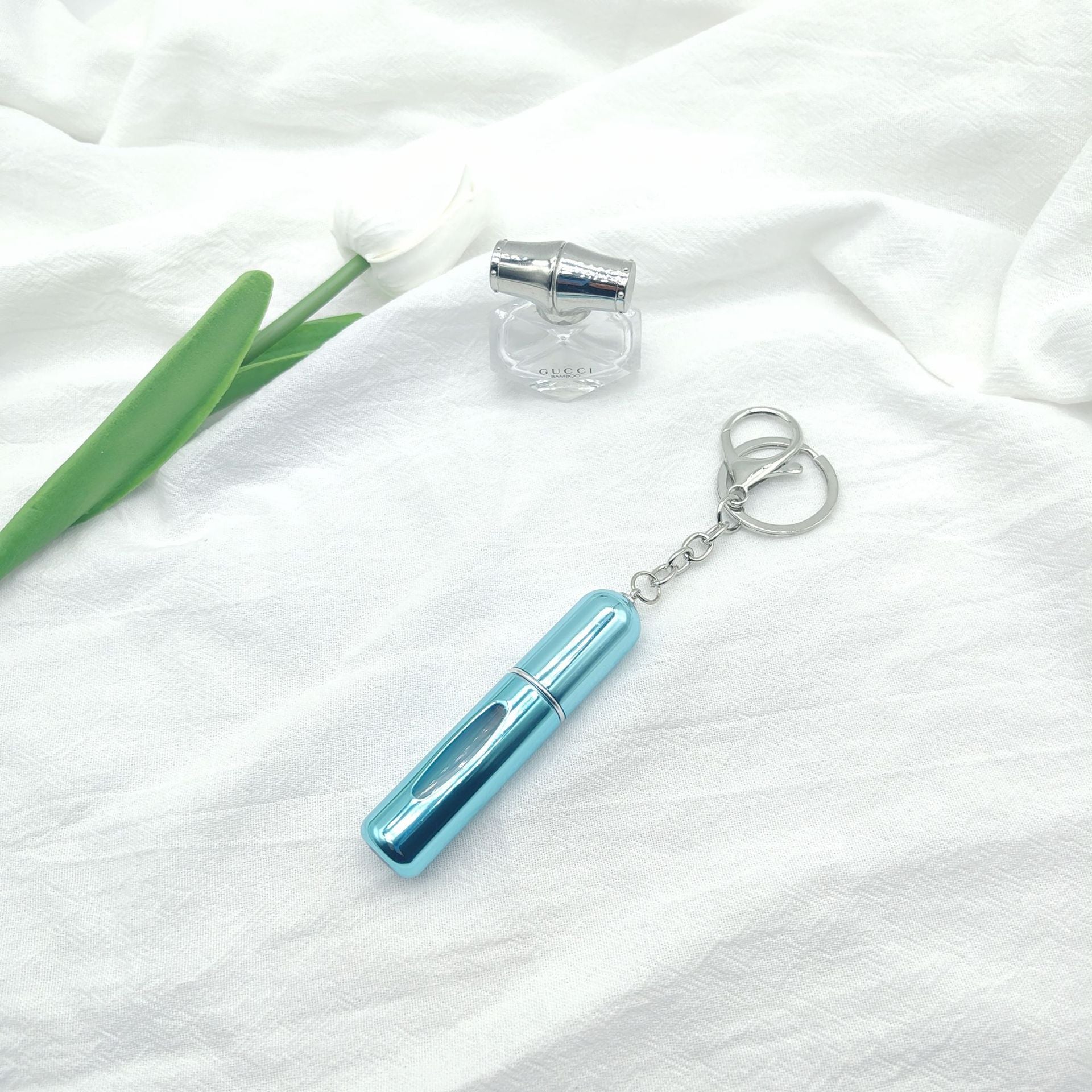 Wholesale bottom filling pump 5ml high color value sample key chain perfume bottle