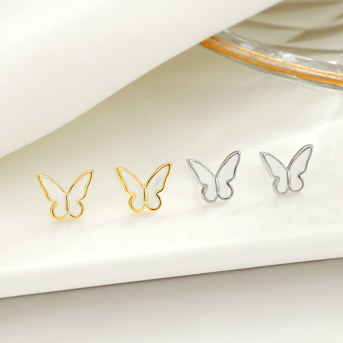 Wholesale S925 Drop Glazed White Butterfly Sterling Silver Earrings