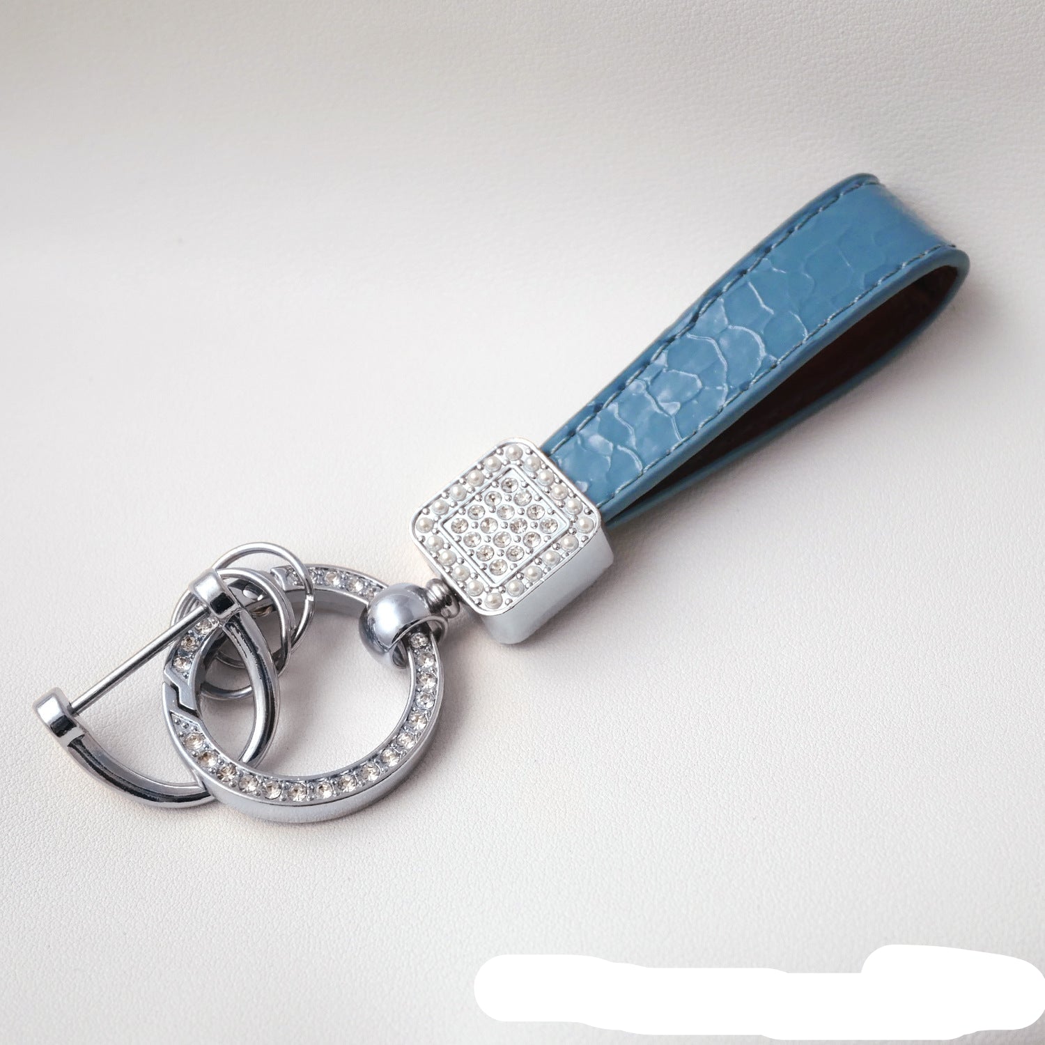 Wholesale Fashionable textured diamond spring ring keychain