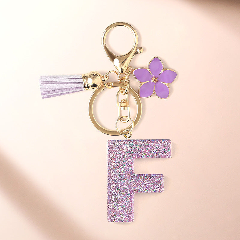 Wholesale Sparkling Pink 26 English Letter Purple Flower Keychain