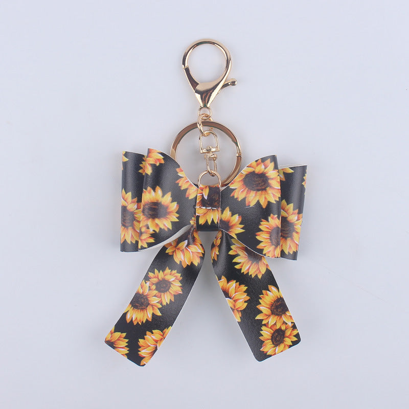 Wholesale Cartoon Aztec Color Bow Leather Keychain