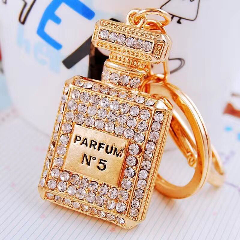 Wholesale Pearl Perfume Bottle Bow Rhinestone Keychain Bag Charm Chic Fashion Accessory Boutique Gift