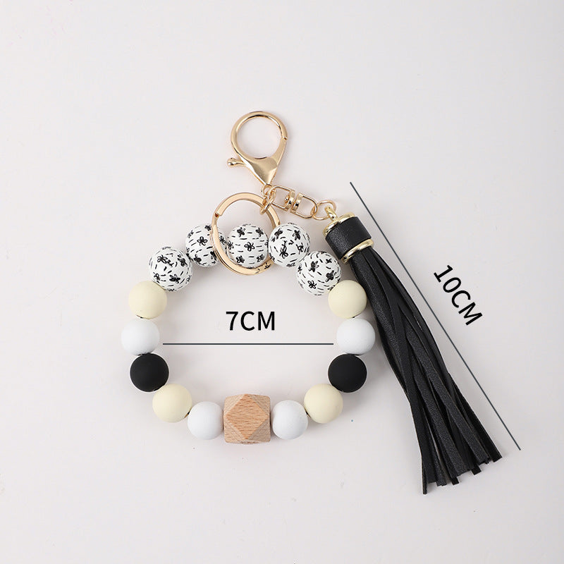 Llavero de muñeca de silicona de borla al por mayor