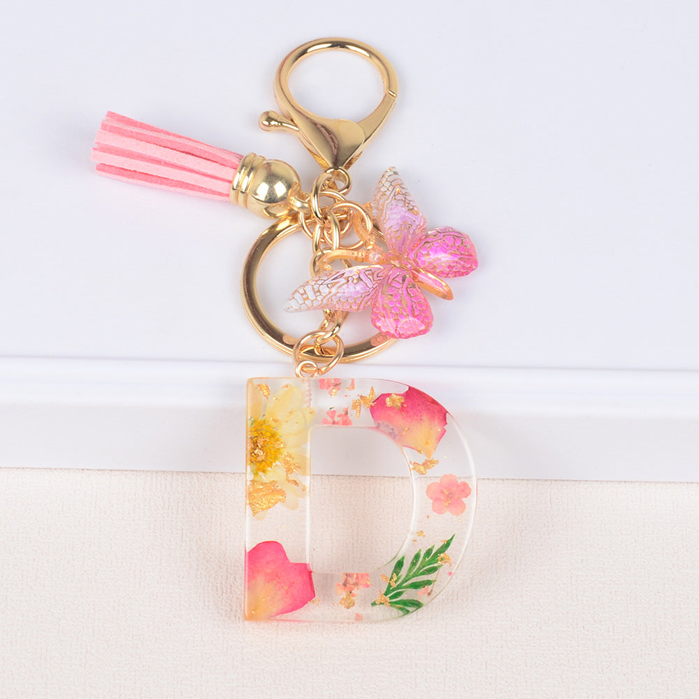卸売ドライフラワーレター樹脂キーホルダー