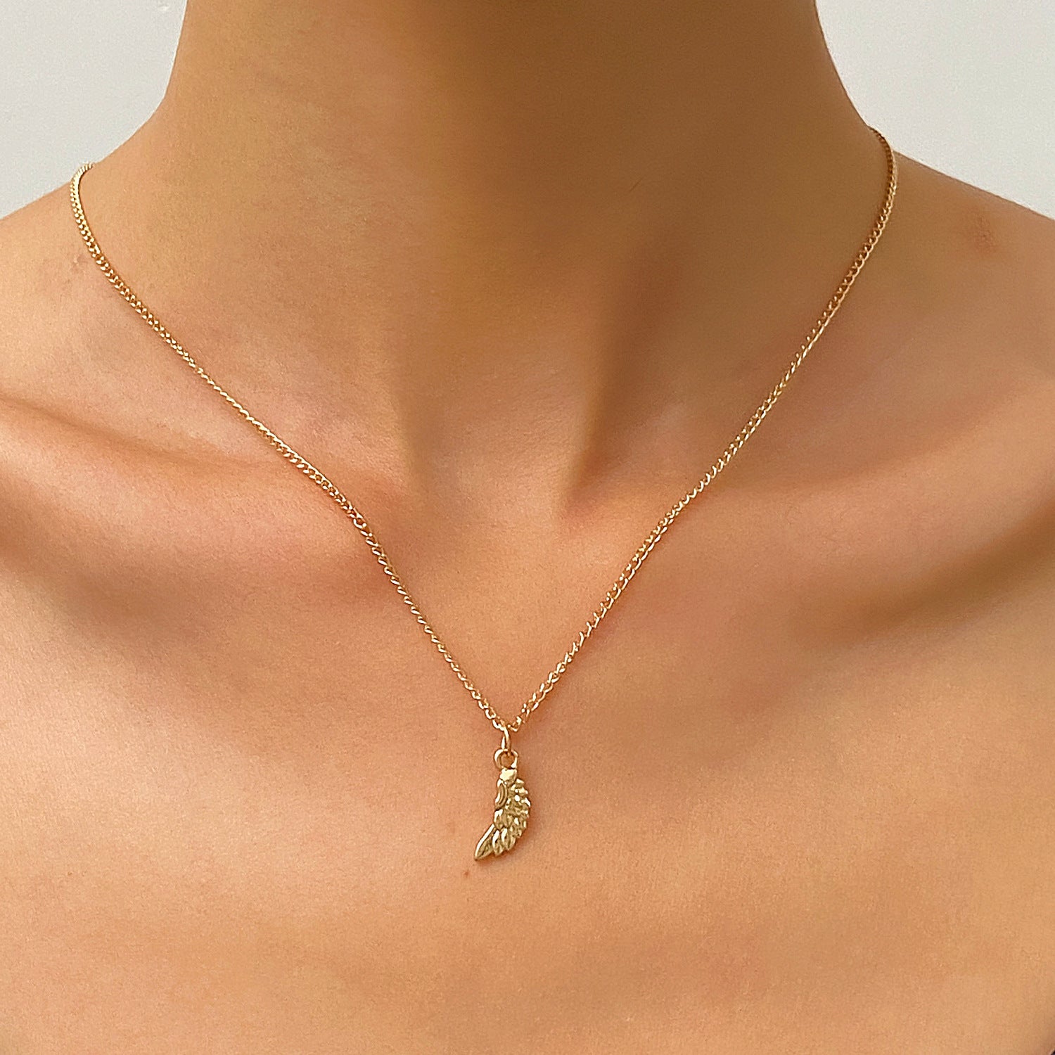 Wholesale Feather Clavicle Alloy Earrings