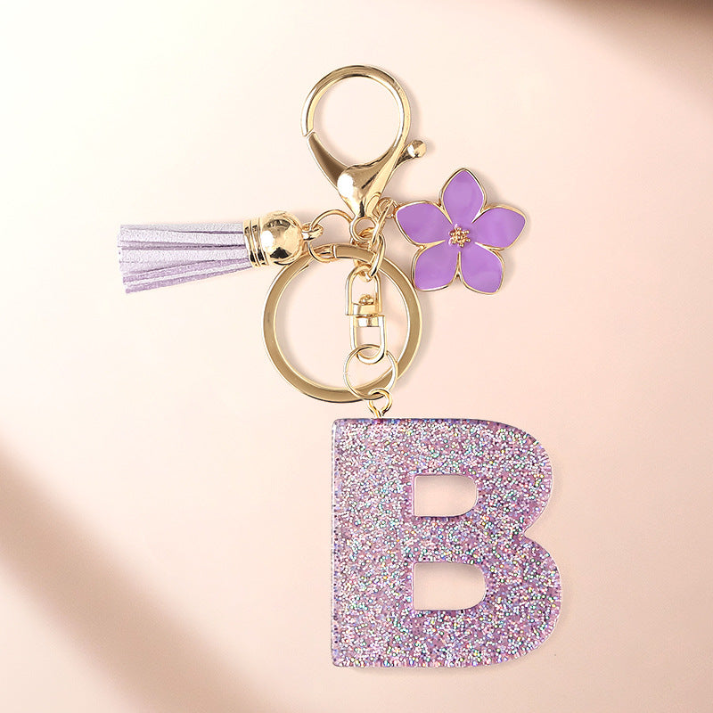 Wholesale Sparkling Pink 26 English Letter Purple Flower Keychain