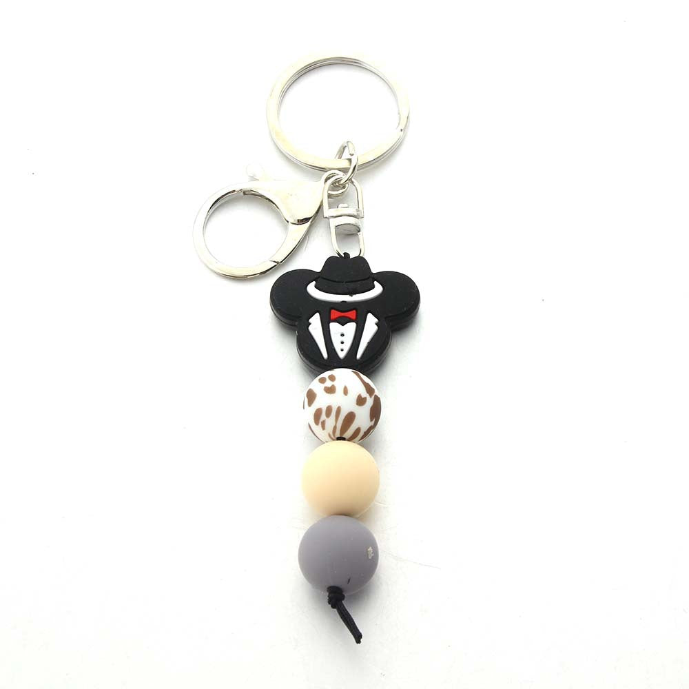 Wholesale Cow Tooth Hat Letter Silicone Bead Keychain