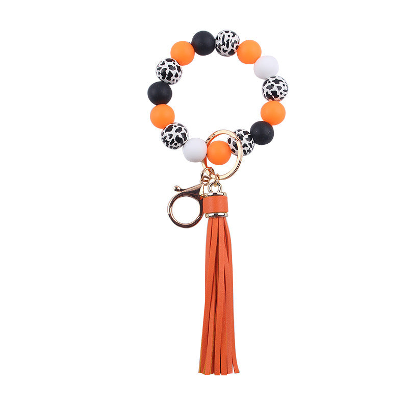 Wholesale Leather Tassel Silicone Beads Wooden Beads Bracelet Keychain