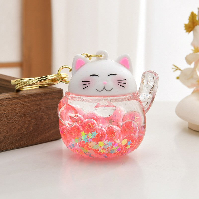 Wholesale Acrylic flowing sand bottle bag keychain