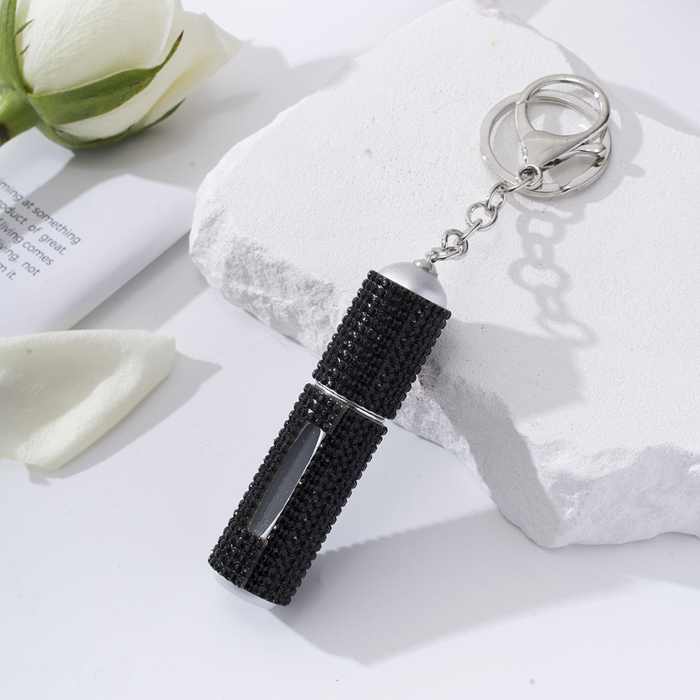 Wholesale  diamond-studded creative perfume bottle keychain is easy to carry