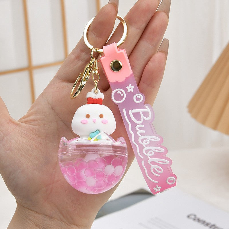 Wholesale Acrylic flowing sand bottle bag keychain