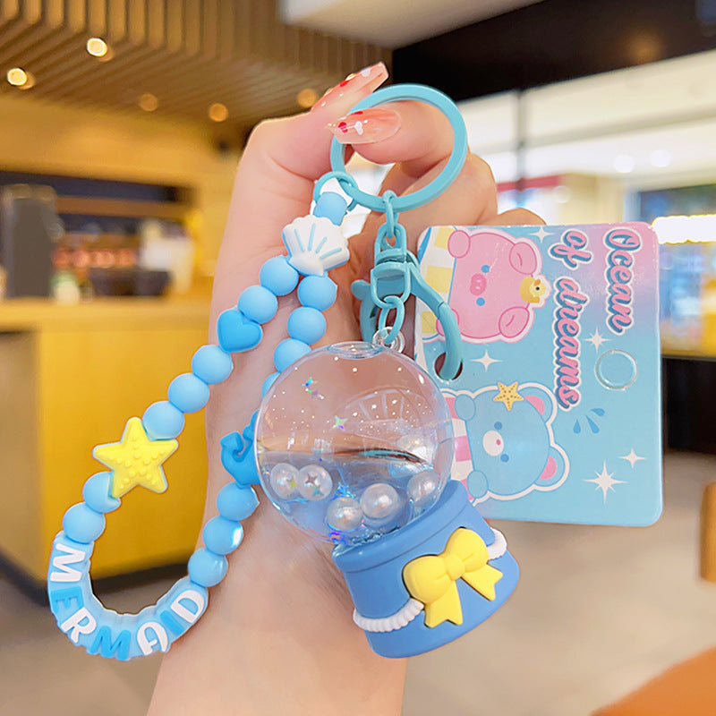 Cadena de llave acrílica de la bola de cristal del océano de sueño al por mayor