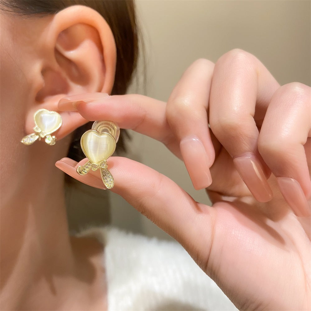 Wholesale Easter hollow asymmetrical white rabbit stainless steel earrings