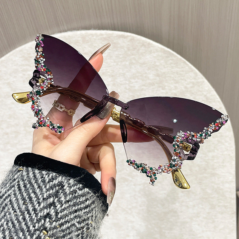 Wholesale Women's butterfly shape diamond frameless sunglasses