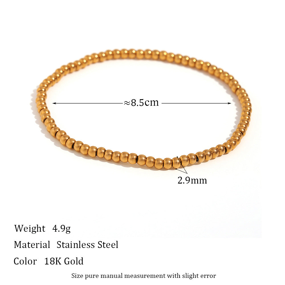 Wholesale Gold and silver colored round bead elastic stainless steel bracelets