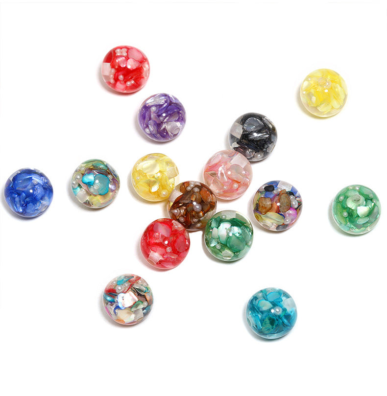 Wholesale  Random 100pcs/pack  Irregularly shaped     vibrant mother-of-pearl inlaid with translucent,  perforated beads.